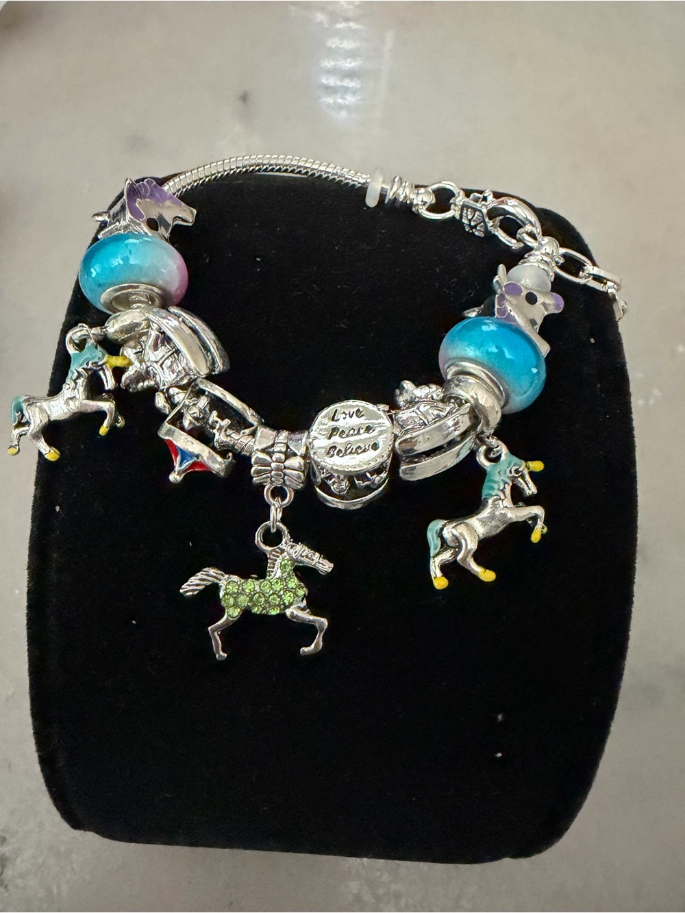 Silver tone Bracelet with Blue Beads and Unicorn Charms